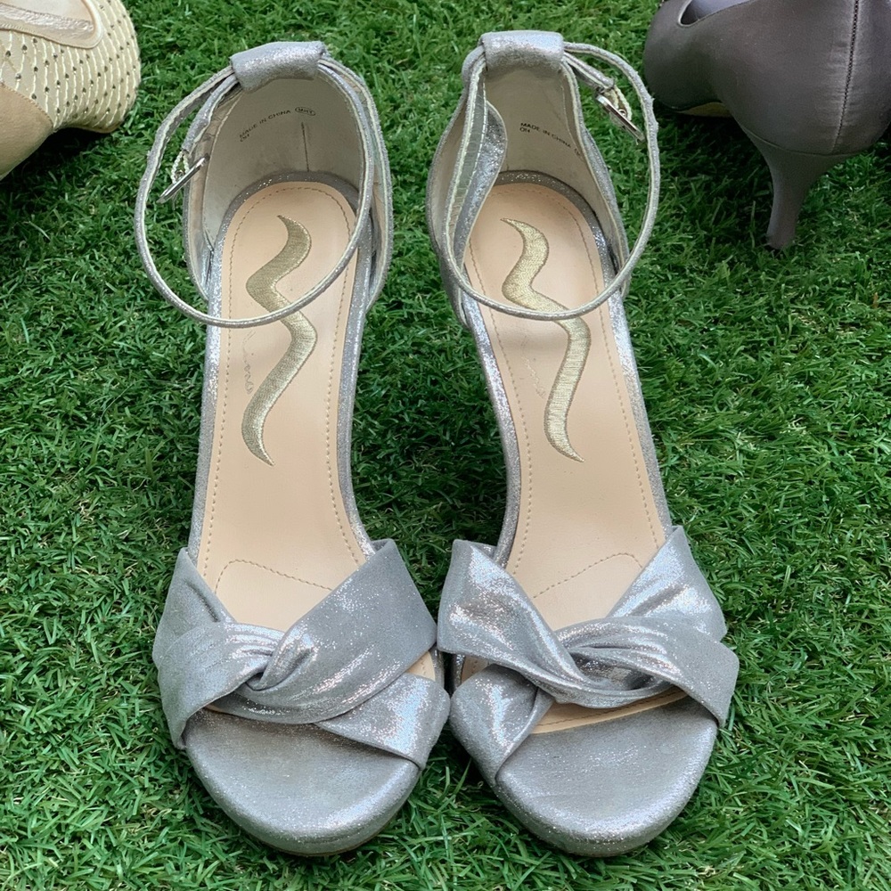 silver open toe heels! never warn!